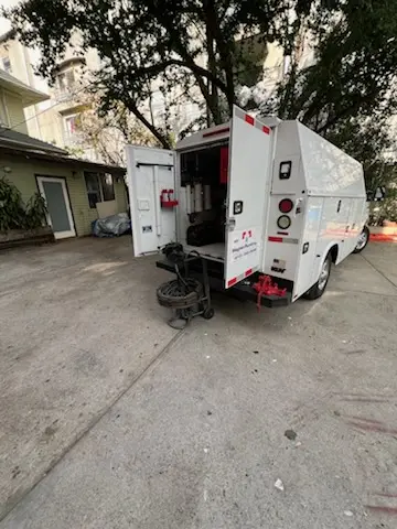 Magnet Plumbing service vehicle on-site for Grease Trap Cleaning in San Diego Country Estates